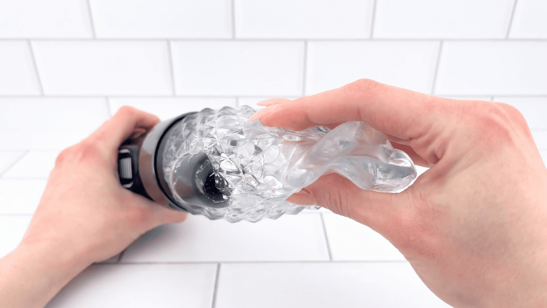 GIF of Automatic Vibrating Male Masturbator being squished soft jelly 