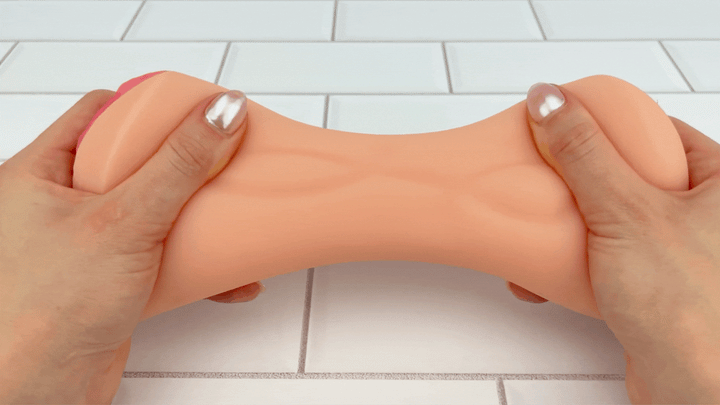 GIF of Dual Ended Stroking Sleeve - Tight Pussy and Ass being stretched 