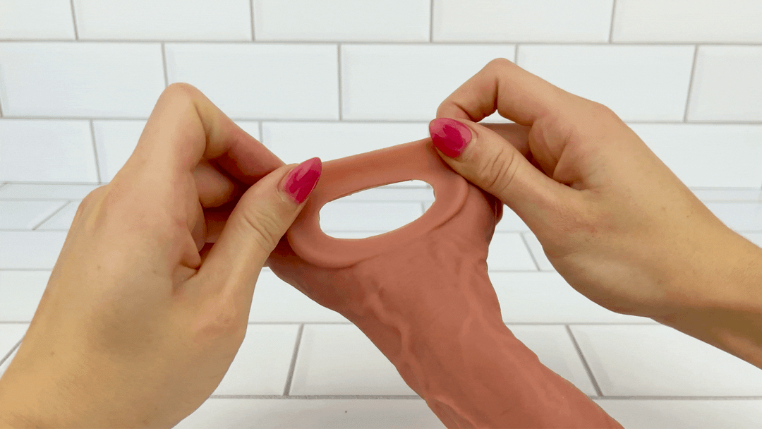 GIF of ball loop from Vibrating Penis Extender being stretched to show soft material 