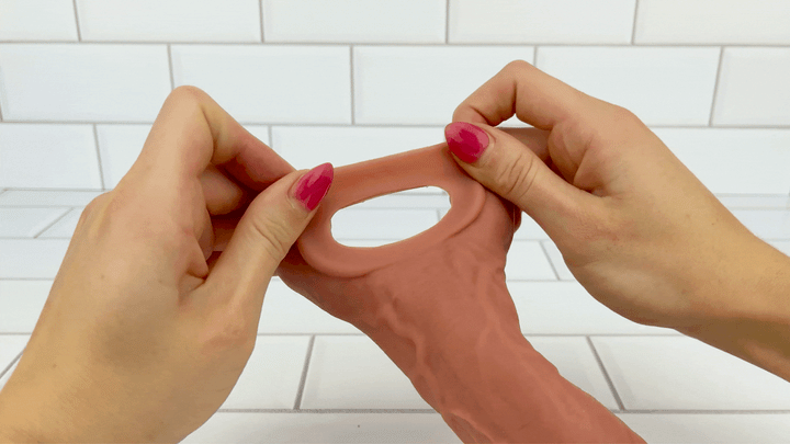 GIF of ball loop from Vibrating Penis Extender being stretched to show soft material 
