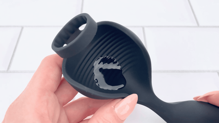 GIF of Vibrating Cock Ring plus P-Spot and Ball Stimulator lube vibrating in ball stimulator 
