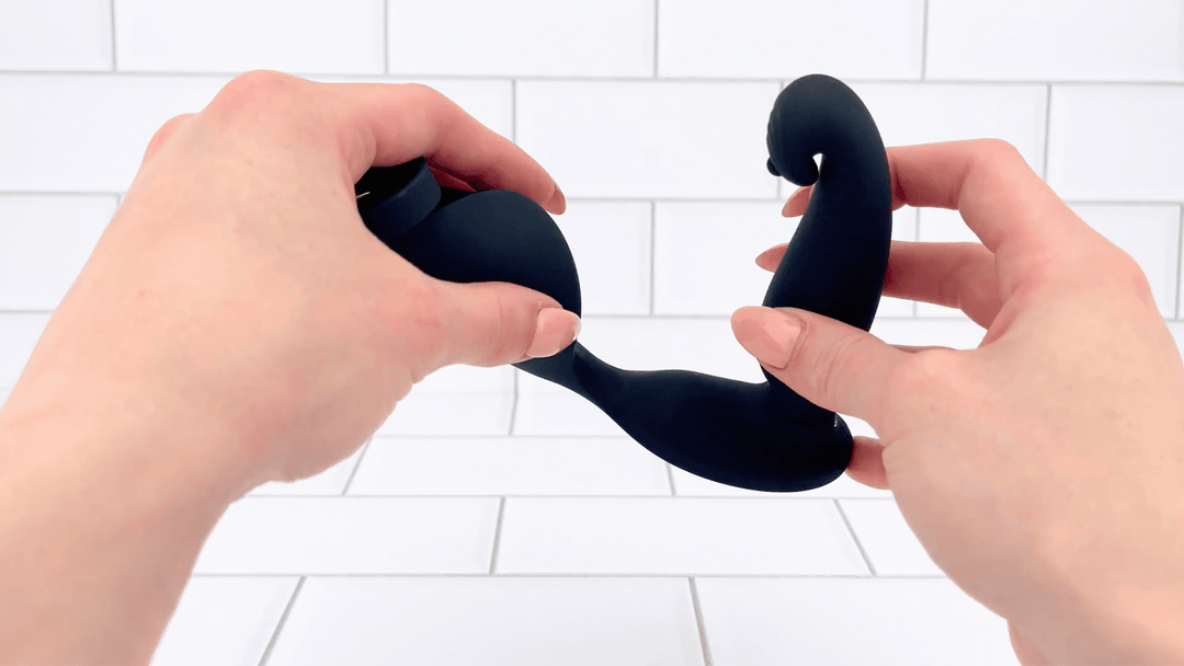 GIF of Vibrating Cock Ring plus P-Spot and Ball Stimulator being bent to show flexibility 