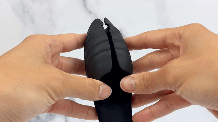 GIF of penis massager flaps being opened
