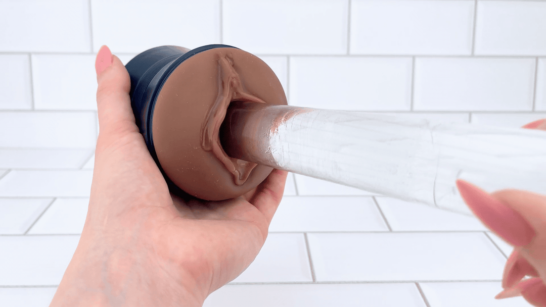 GIF of Dual-Ended Vibrating Masturbator glass dildo sliding into it 