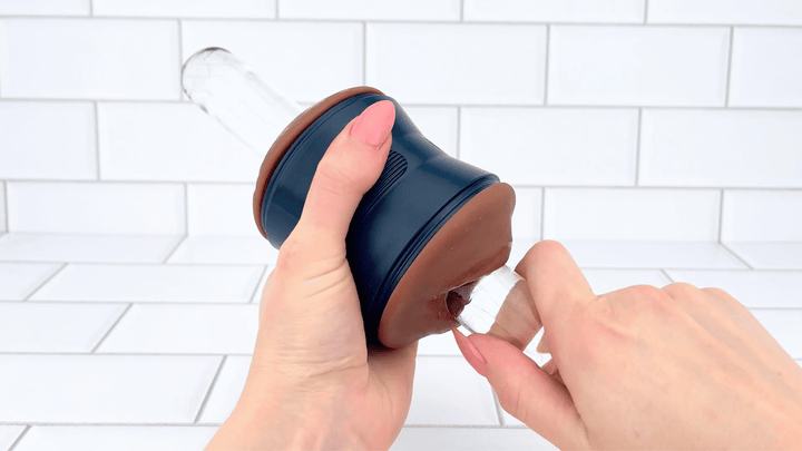 GIF of glass dildo sliding into mouth opening from Dual-Ended Vibrating Masturbator 