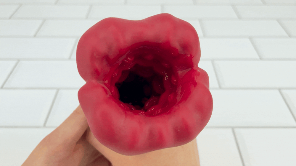 GIF angled view of pleasure nubs inside Flaming Lips for Him Masturbator  lining vibrating 