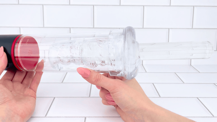 GIF of 3-in-1 Brotar Vibrating Penis Pump, Stroker, and Sucker  sucking glass dildo 