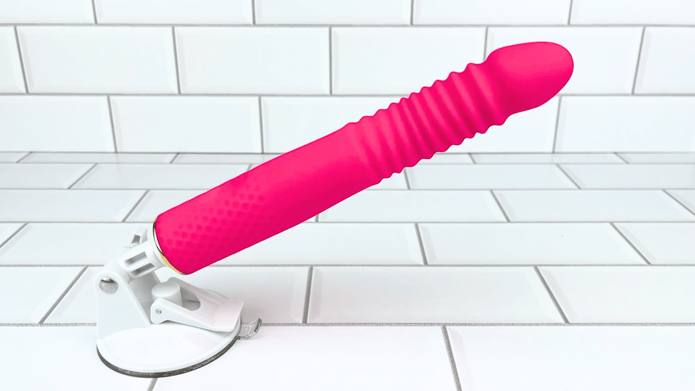 GIF of Thrusting and Vibrating Suction Cup Dildo thrusting motion 