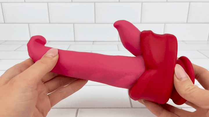 hands holding Dual-Action Thrusting & Rotating Tongue thrusting in motion 
