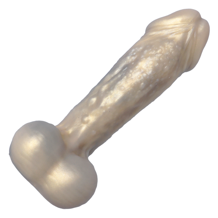 view of testicles from golden alien dildo 