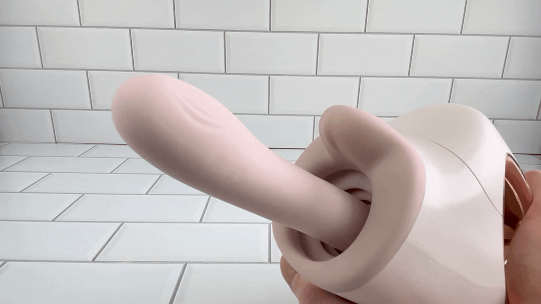 GIF of Automatic Thrusting and Vibrating Telescopic Sex Machine thrusting from angled view 