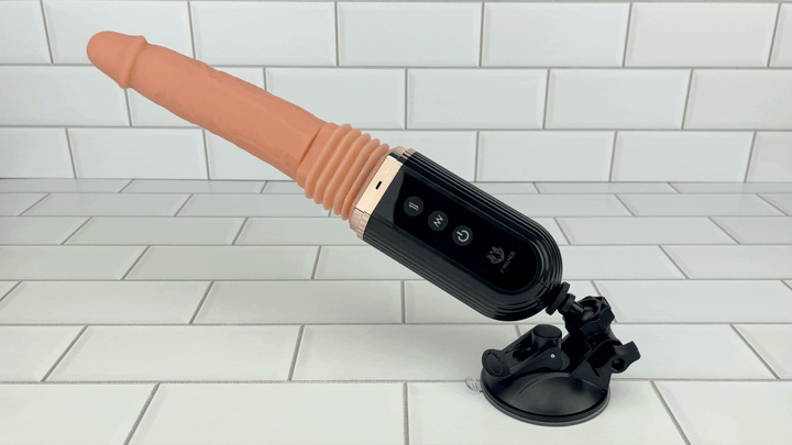 GIF of Hands-Free Thrusting & Vibrating Silicone Dildo entire product in action 