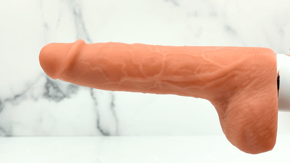 GIF of powerful thrusting from Warming, Thrusting, Vibrating, and Waterproof Dildo 