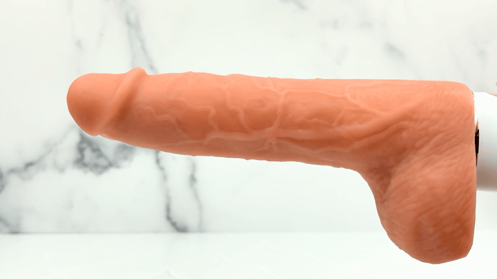 GIF of powerful thrusting from Warming, Thrusting, Vibrating, and Waterproof Dildo 