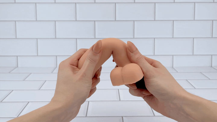 GIF of Vibrating Dildo with Balls  shaft being bent 