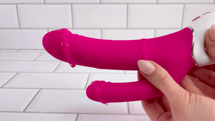 GIF lube vibrating off of Waterproof Silicone Double Penetrating Vibe shafts 