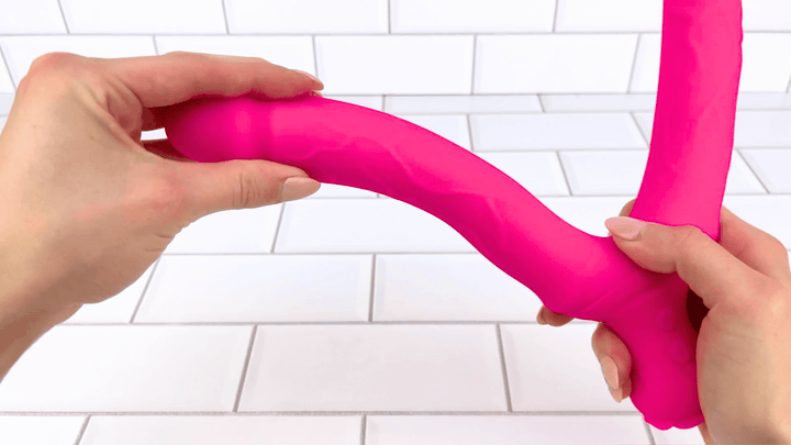 GIF of flexibility from Bendy Silicone Double Dildo Vibrator with Clit Teaser