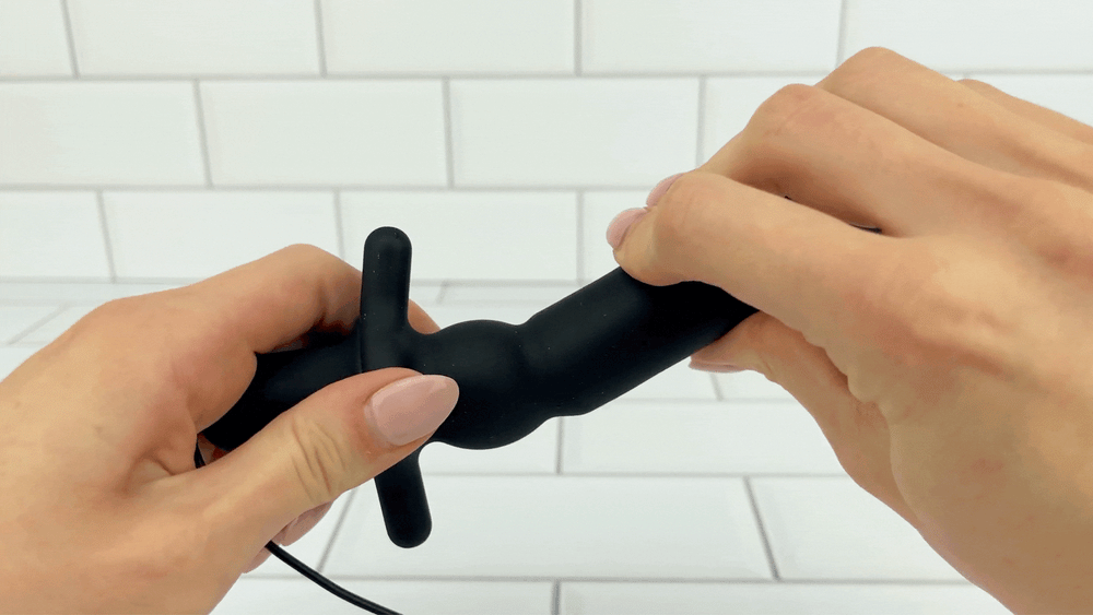 GIF of 7 Function Silicone Vibrating Prostate Massager being bent to show it will adjust to your shape 