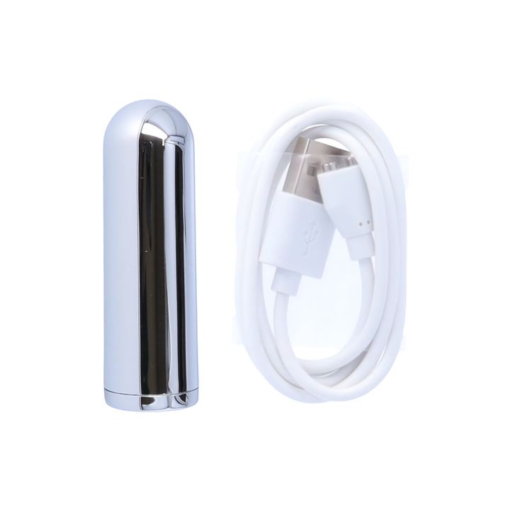 rechargeable bullet from vibrating butt plug as seen next to charging cable 