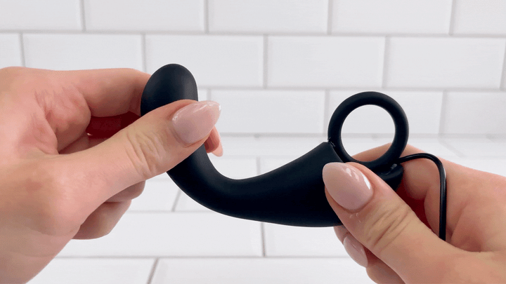 GIF of black prostate massager being bent to show flexibility 