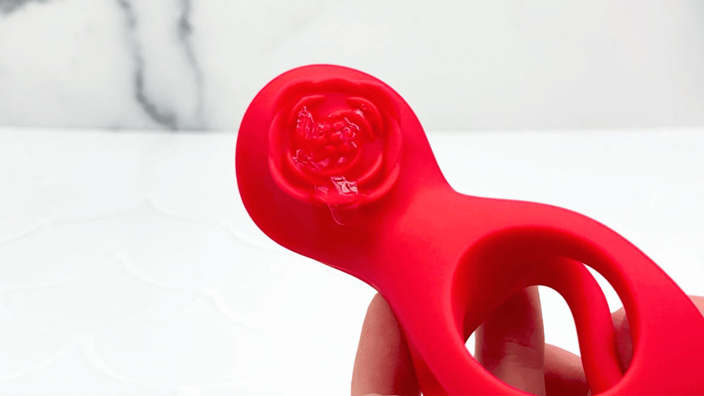 GIF of clit teasing rose from Lover's Rose Dual Cock-ring