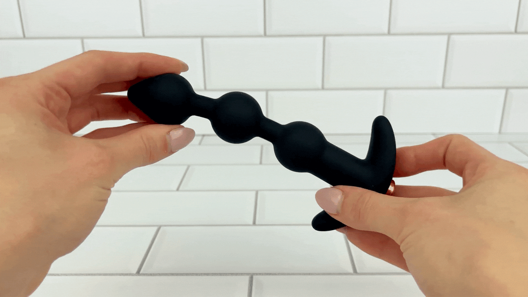 GIF of Macio Silicone Beaded Anal Vibrator Plug being bent to demonstrate flexibility 