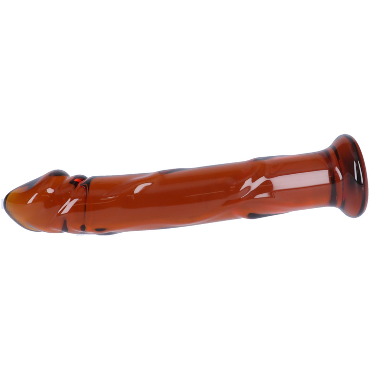 side view of amber glass dildo