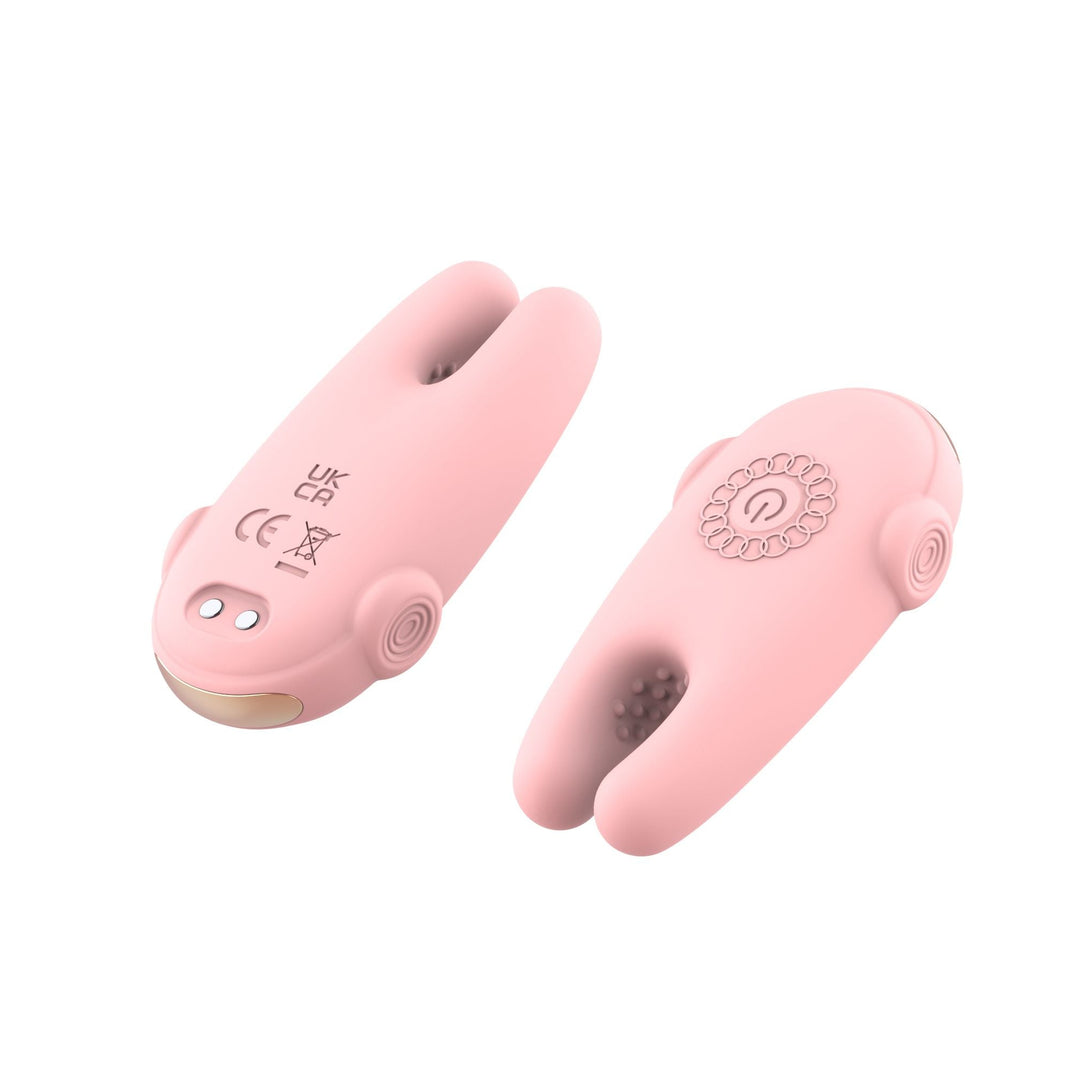 A pink dual-stimulation personal massager shown from two angles on a plain white background.