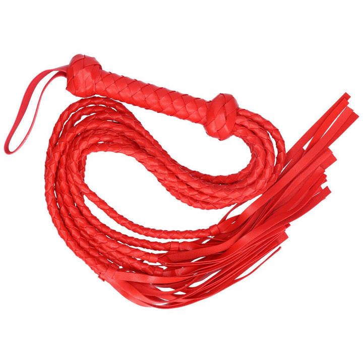 Bird's eye view of a long red braided flogger.