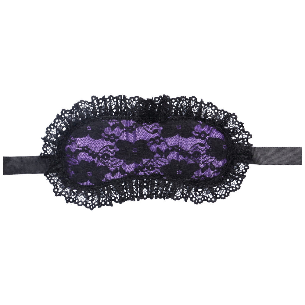 Bird's eye view of a purple lace blindfold with satin straps.