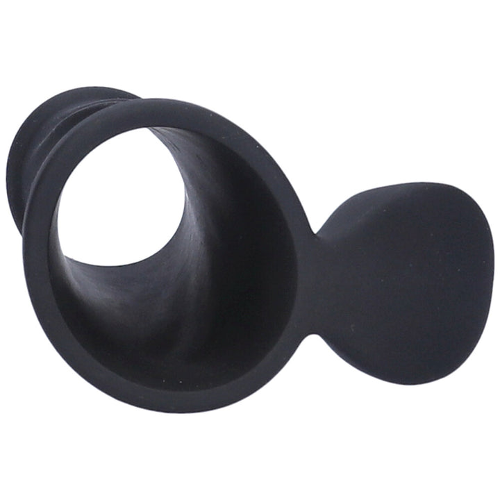 Entryway view of black vibrating silicone cock cage.