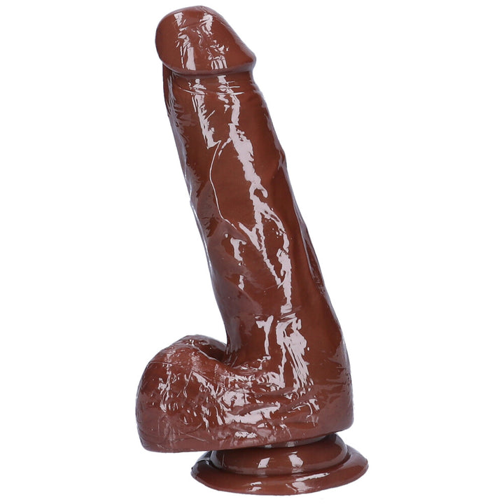 Side view of medium brown coffee colored realistic suction cup dildo with balls.