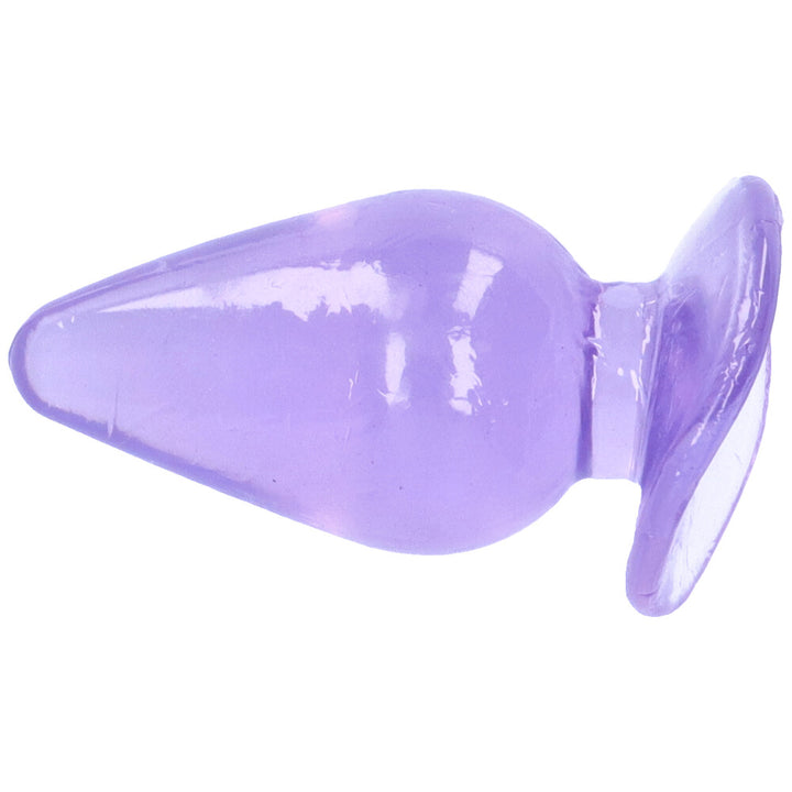 Bird's eye view of purple tapered anal plug with suction cup base.