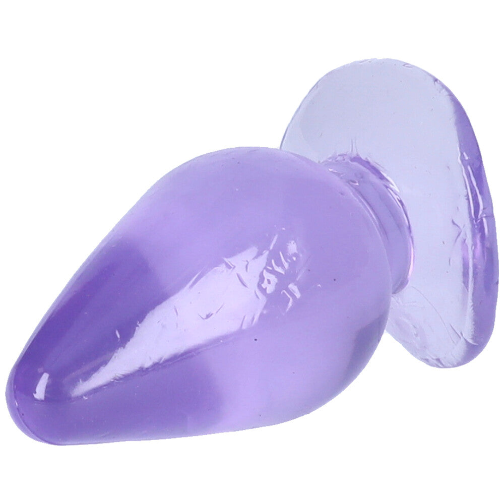 Close-up view of purple tapered anal plug with suction cup base.