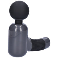 Massage gun lying on it&