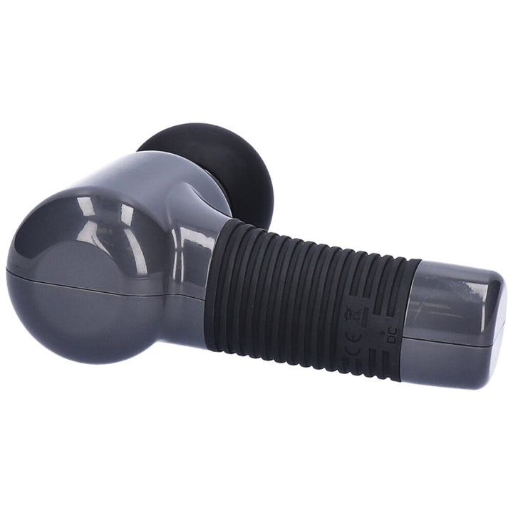 Massage gun facing back laying down showing charging port and handle