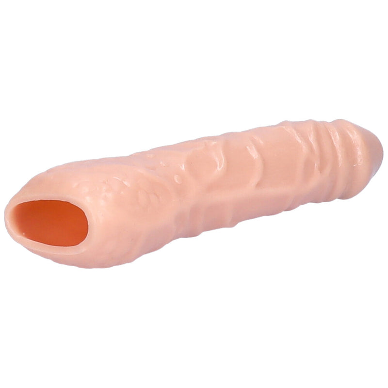 Beige hollow penis extender facing back right to show interior
