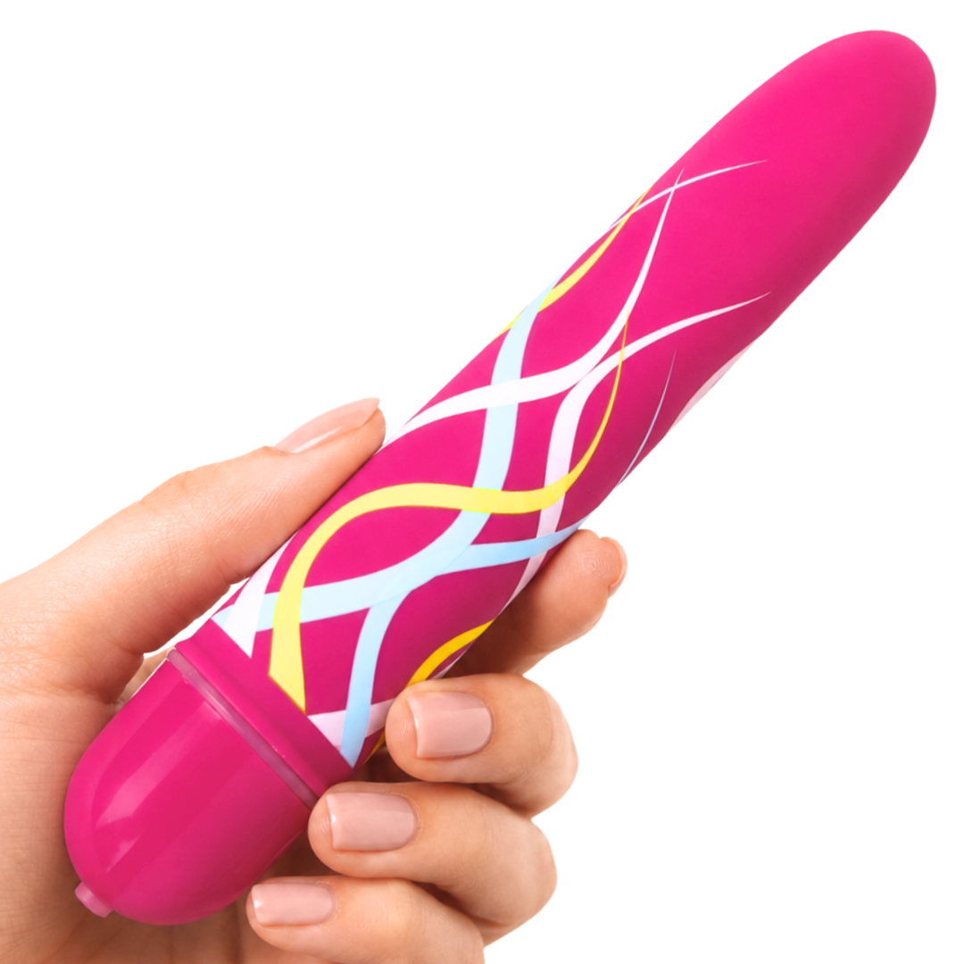 A hand holding a pink personal massager with a glossy finish and white, yellow, and blue wavy patterns on the body, set against a plain white background.