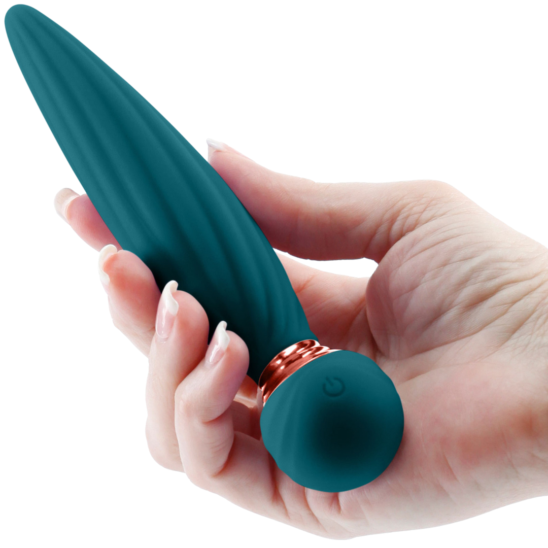 Sugar Pop Twist Rechargeable Silicone Vibrator being held in a hand showing the power button location.