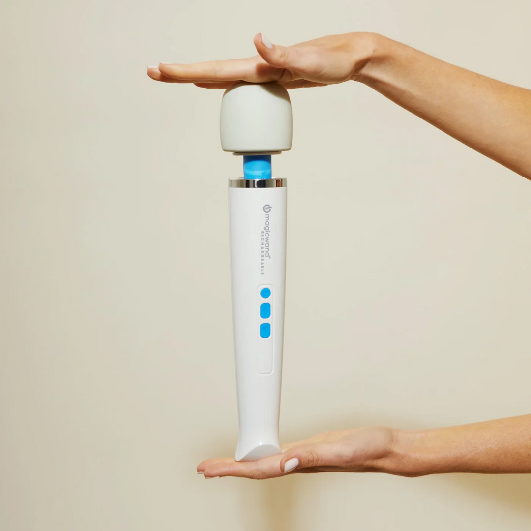 hands holding Rechargeable Magic Wand lengthwise 