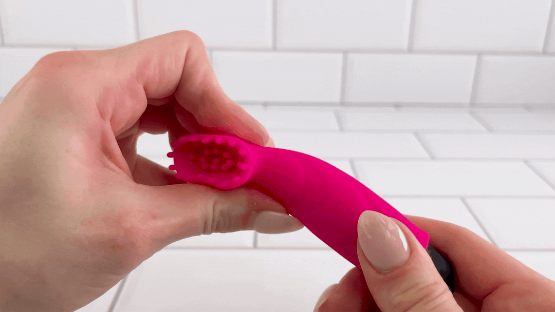 GIF of Wet Dreams Coochy Brush being bent to show soft silicone 