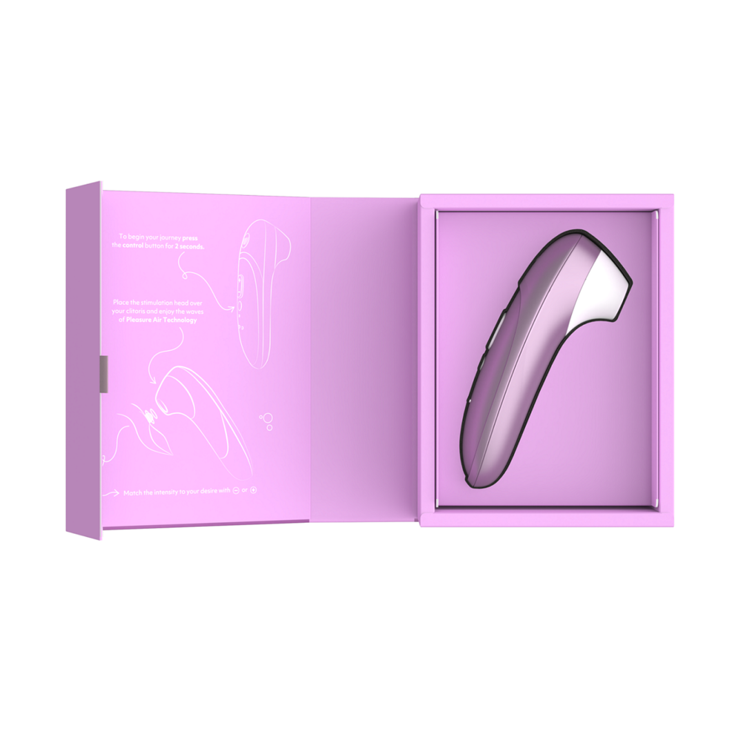 Womanizer Pro Rechargeable Silicone Air Pulse Clitoral Vibrator view of open packaging 
