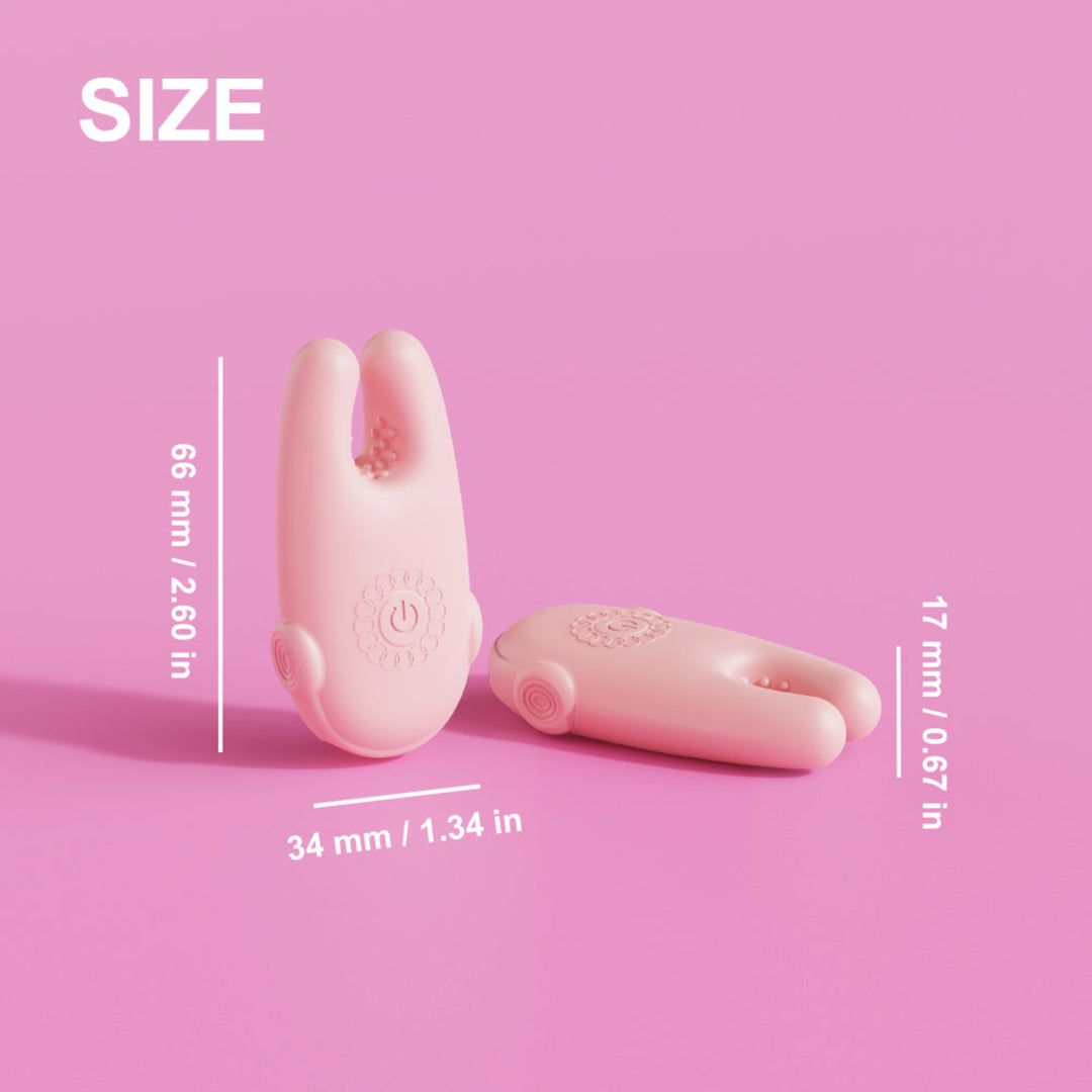 Pink silicone intimate device shown on a pink background with overlaid size measurements labeled 66 mm, 17 mm, and 34 mm, plus a large SIZE heading.
