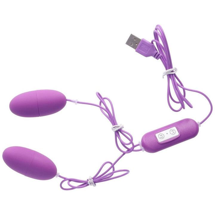 Bird's eye view of purple rechargeable double vibrating bullet.