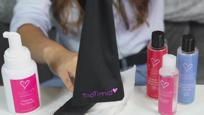 Bato vibrator being put into a TooTimid toy storage bag. Search TT-S01 on TooTimid.com