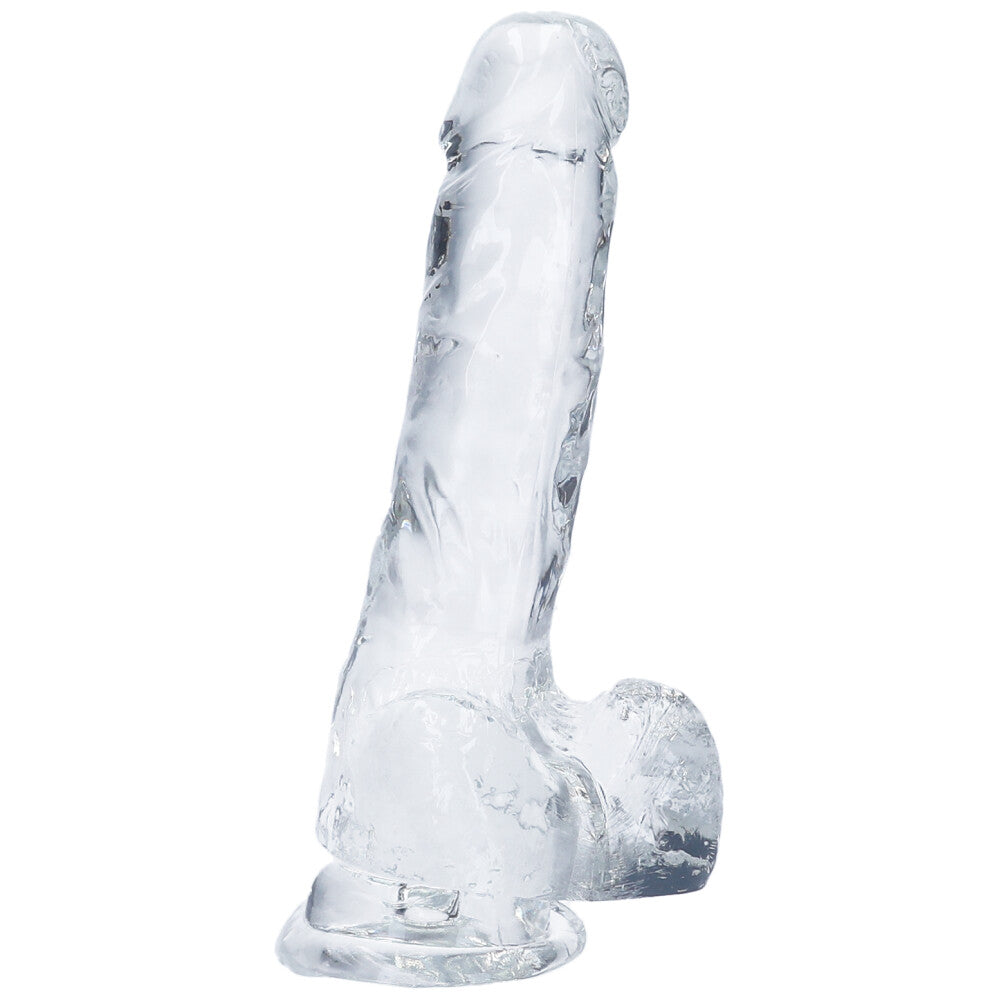 Alternate side view of medium clear realistic suction cup dildo with balls.