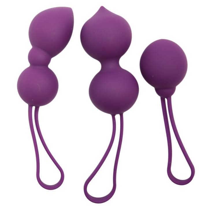 Another image of the 3 kegel balls! These balls included a seamless looped cord for easy removal and are made of super soft silicone! Insert these weighted balls and wear around the house, during masturbation, or during foreplay to spice things up and help tone your inner walls!