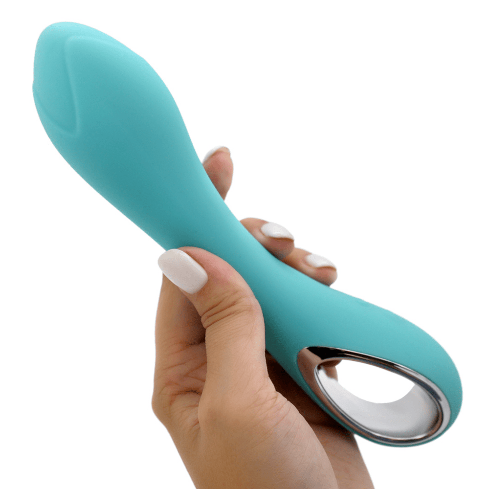 Image of hand holding the vibrator turned slightly to the side.