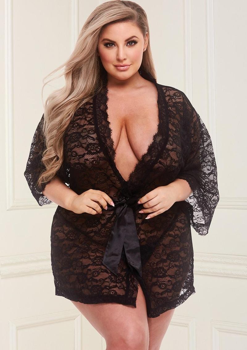 Image displays a model wearing a allover lace & satin robe in the black queen size option.
