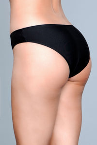 Model facing back left wearing black microfiber bikini panty